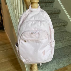 Pink backpack with lots of pockets